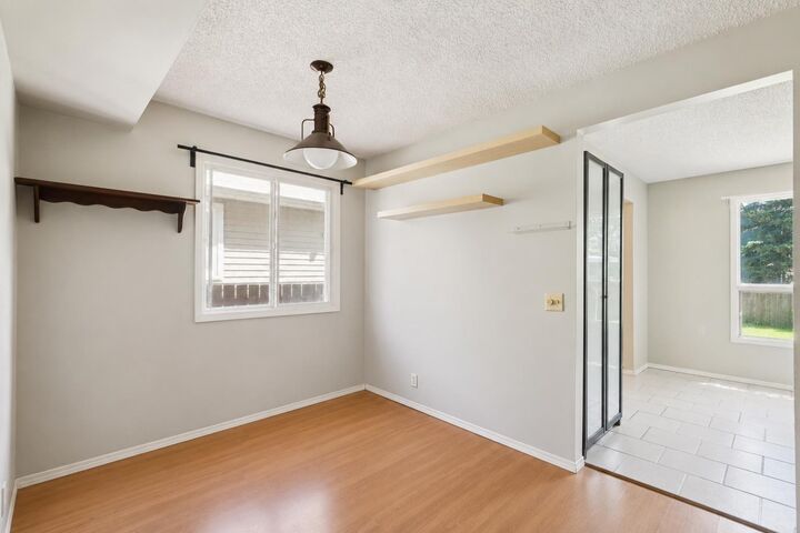 Property Photo:  864 Queensland Drive SE  AB T2J 6E6 