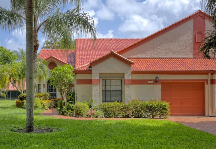 Property Photo:  7520 Lexington Club Boulevard A  FL 33446 
