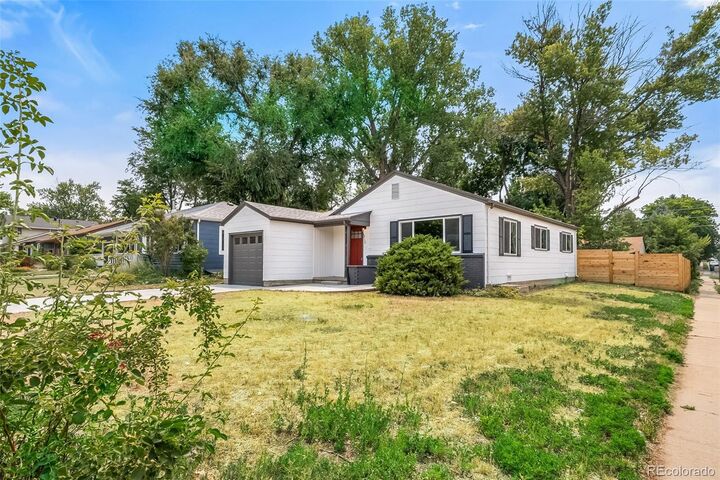 Property Photo:  1210 E Bates Parkway  CO 80113 
