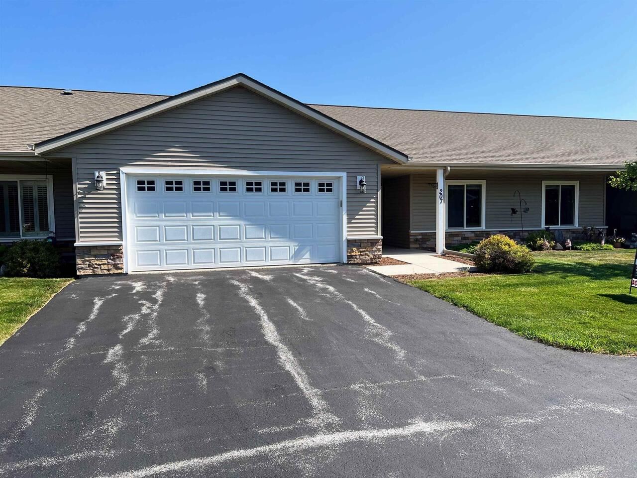 Property Photo:  207 Tower Drive  WI 53085 