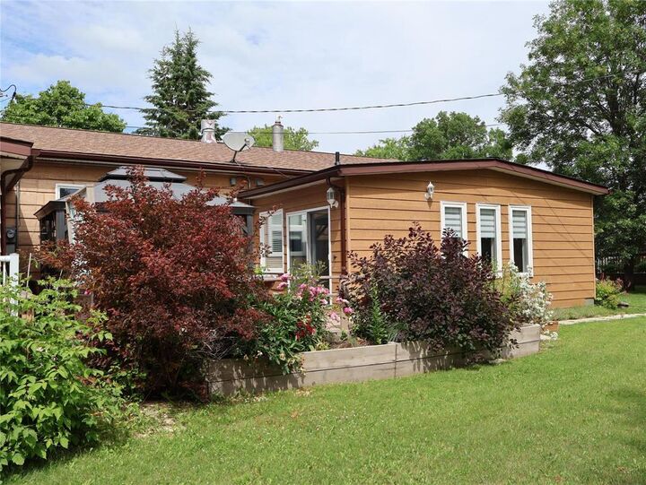 Property Photo: 102 Cedar Avenue MB R0C 1B0