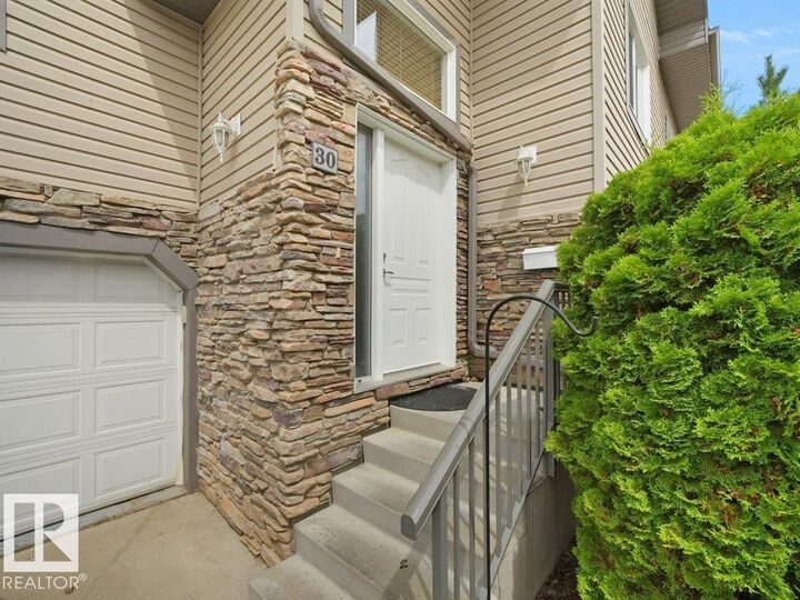 Property Photo: 17715 96 Avenue NW 30 AB T5T 6W9