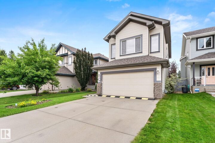 Property Photo:  5519 209 Street NW  AB T6M 0E9 