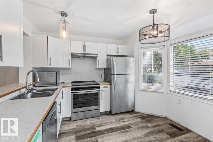 Property Photo:  2135 141 Avenue NW  AB T5Y 1C4 