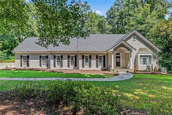 Property Photo:  3040 Spalding Drive  GA 30350 