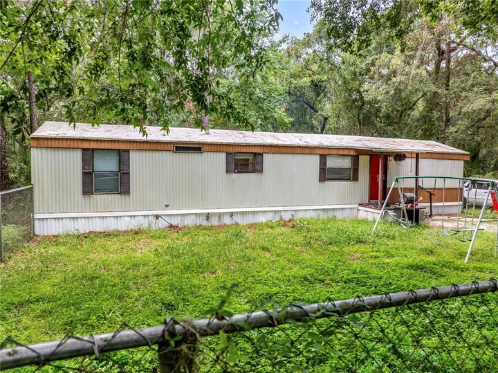 Property Photo:  3080 Cr 417  FL 33538 