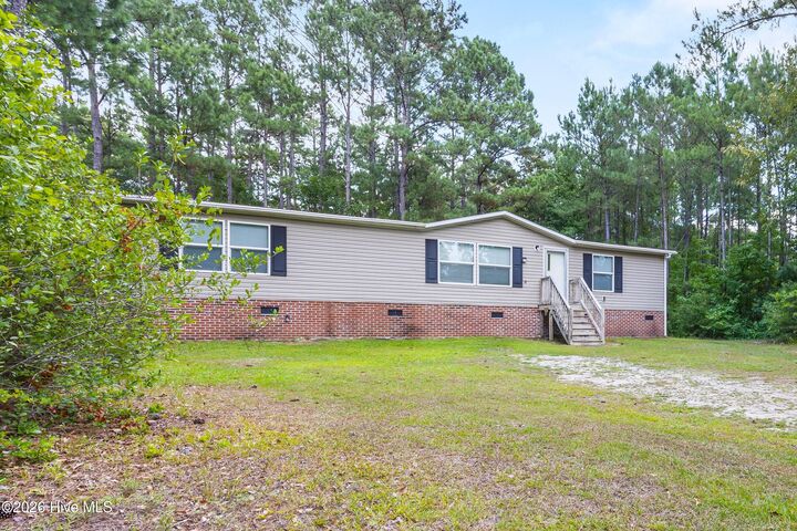 Property Photo: 102 Stone Furrow Trail SE NC 28451