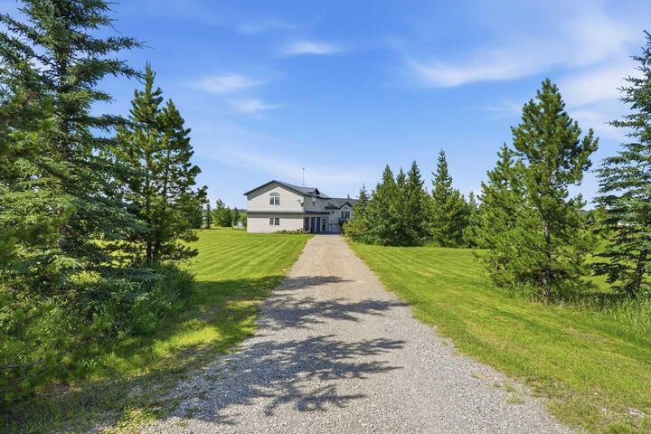 Property Photo: 64242 258 Avenue E AB T1S 4G1
