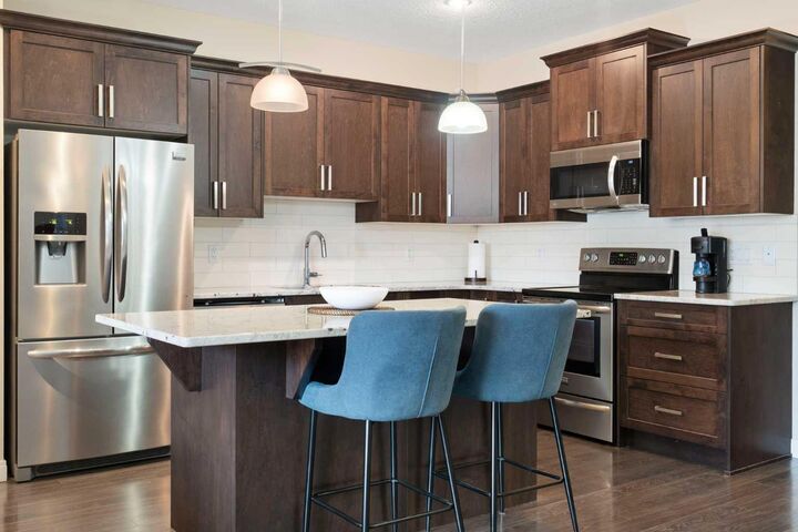 Property Photo:  214 Cooperswood Green SW  AB T4B 3Y6 