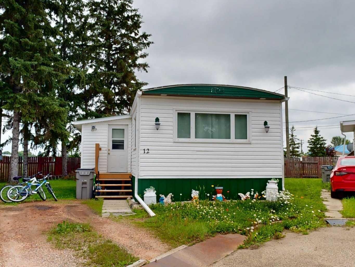 Property Photo:  4822 58 Street 12  AB T4K 1B6 