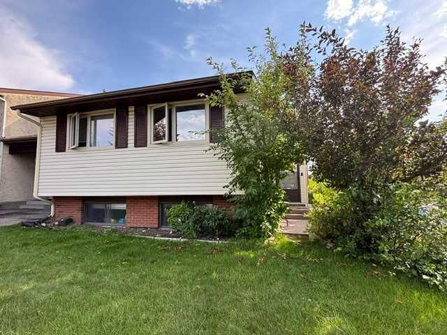 Property Photo: 107 Silvergrove Road NW AB T3B 4Z6