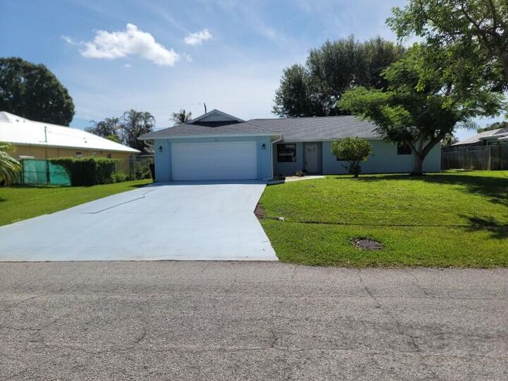 Property Photo: 1841 SE Camden Street FL 34952