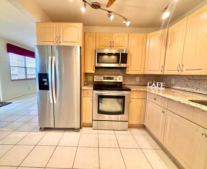 Property Photo:  4032 Newcastle B  FL 33434 