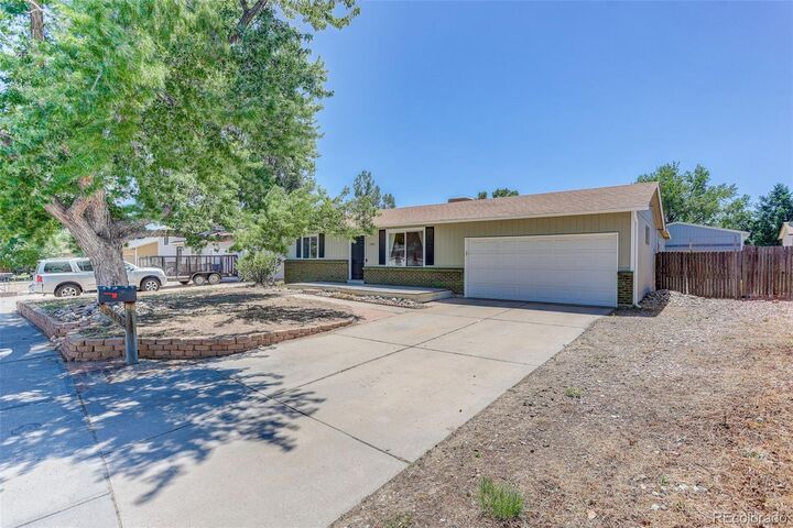 Property Photo:  15488 E Bates Avenue  CO 80013 