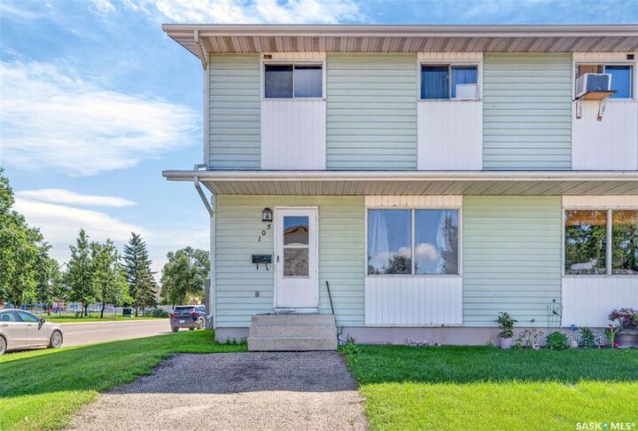 Property Photo: 103-105 Davies Road SK S7K 7L4