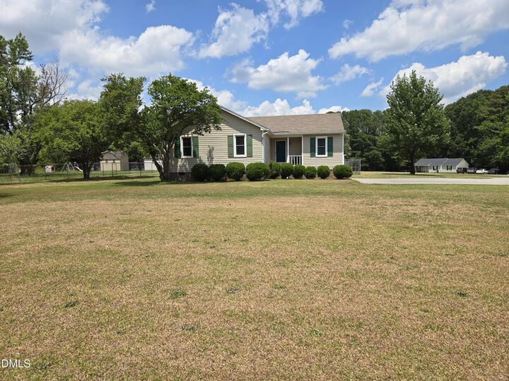 Property Photo:  221 Country Lane  NC 27520 