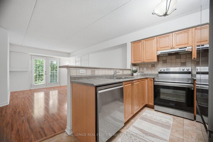 Property Photo:  1490 Bishops Gate 209  ON L6M 4N3 