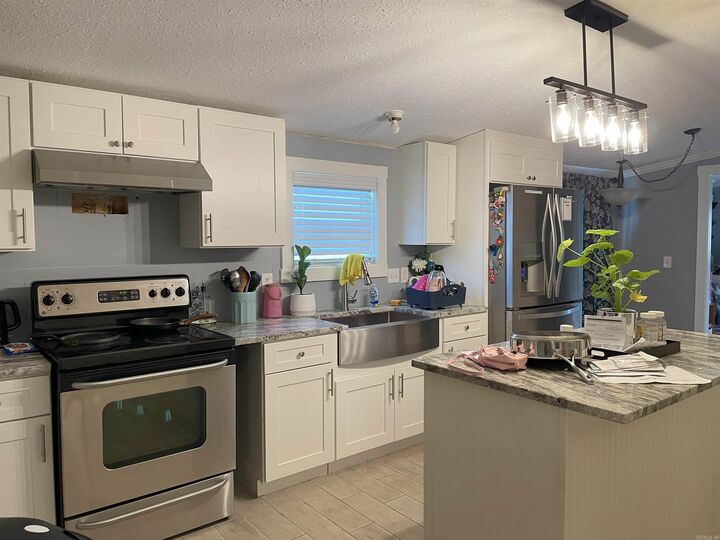 Property Photo:  22 N Madrid  AR 72032 