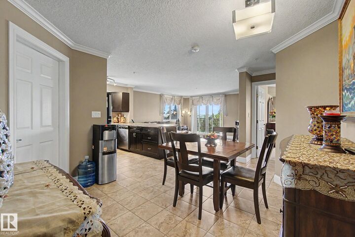 Property Photo: 14604 125 Street NW 307 AB T5X 0B4