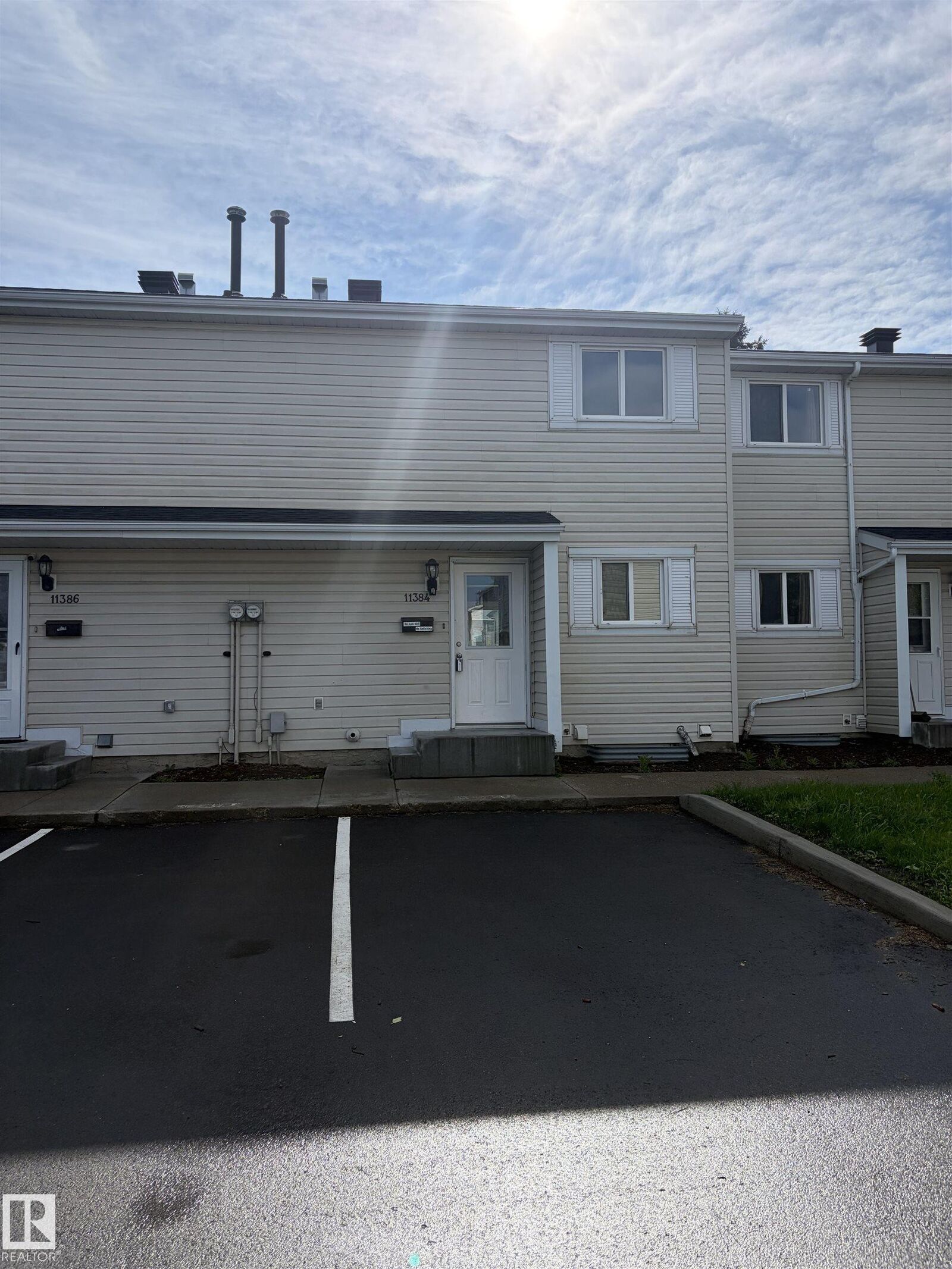 Property Photo:  11384 139 Avenue NW  AB T5X 3L4 
