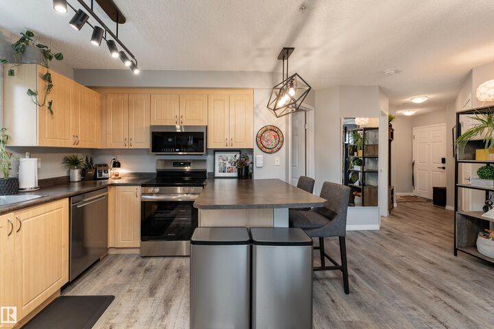 Property Photo: 616 McAllister Loop SW 117 AB T6W 1N1