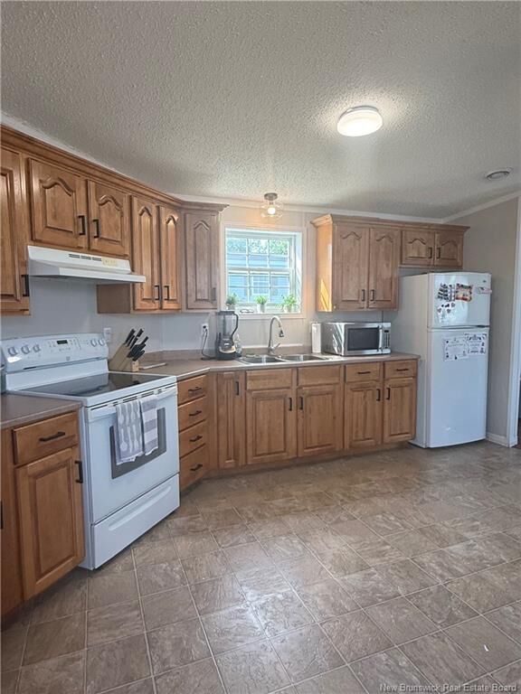 Property Photo:  715 Williston Drive  NB E1V 5Z1 