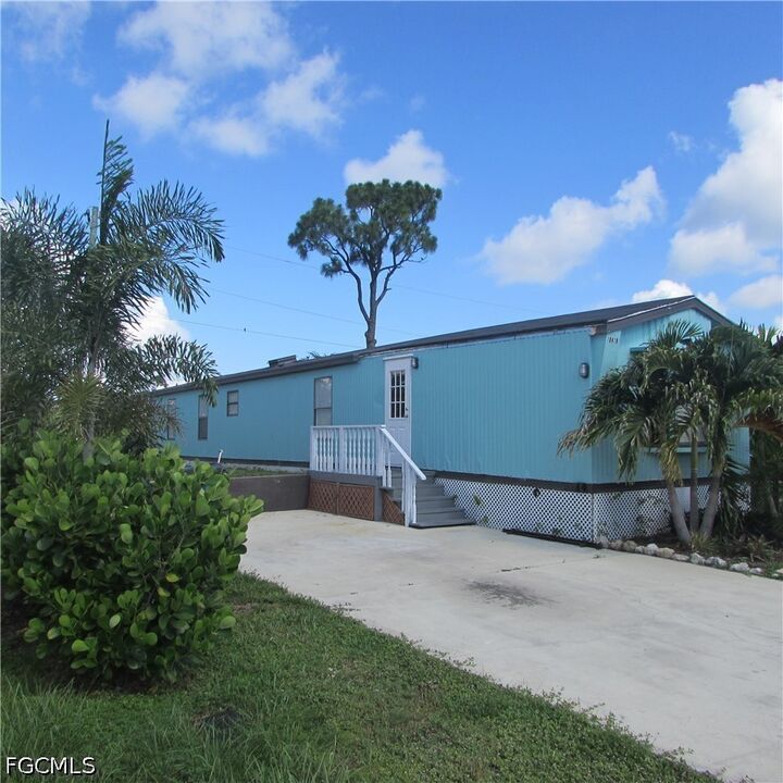 Property Photo:  10419 Trotwood Avenue  FL 33956 