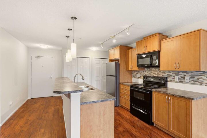 Property Photo: 700 Willowbrook Road NW 2323 AB T4B 0L5