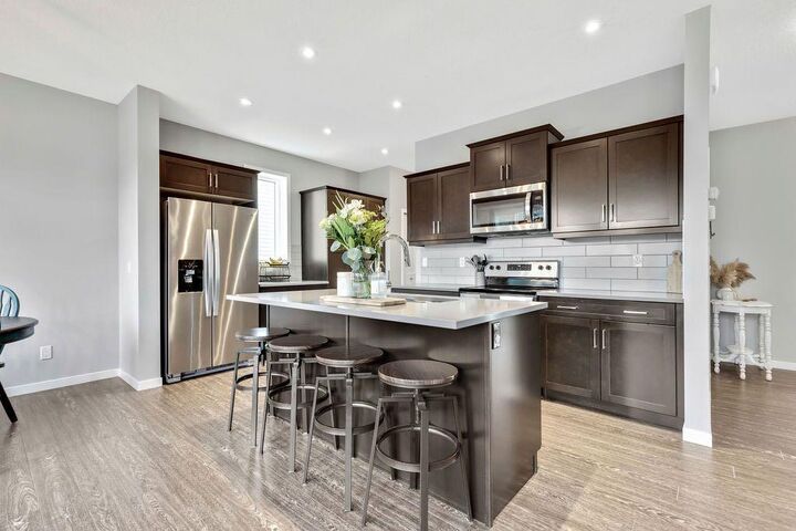 Property Photo: 1714 Montgomery Gate SE AB T1V 0H6