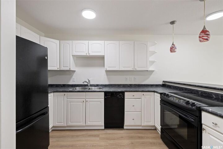 Property Photo:  2315 McIntyre Street 114  SK S4P 3Y8 