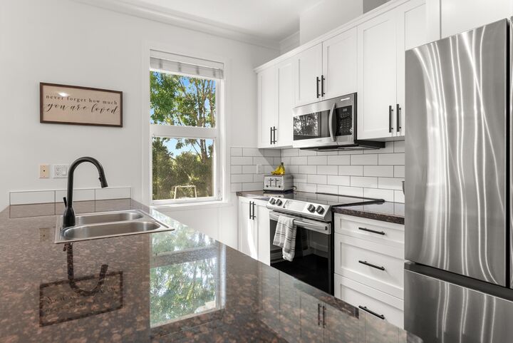 Property Photo: 1375 View Crescent 303 BC V4L 0A3