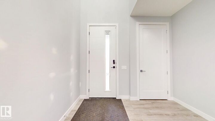 Property Photo:  215 Glenridding Ravine Road SW  AB T6W 5C2 