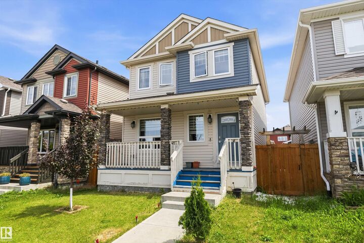 Property Photo: 1563 Tamarack Boulevard NW AB T6T 2E2