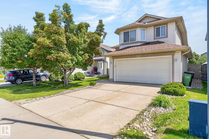 Property Photo: 3211 McPhadden Place SW AB T6W 1L1