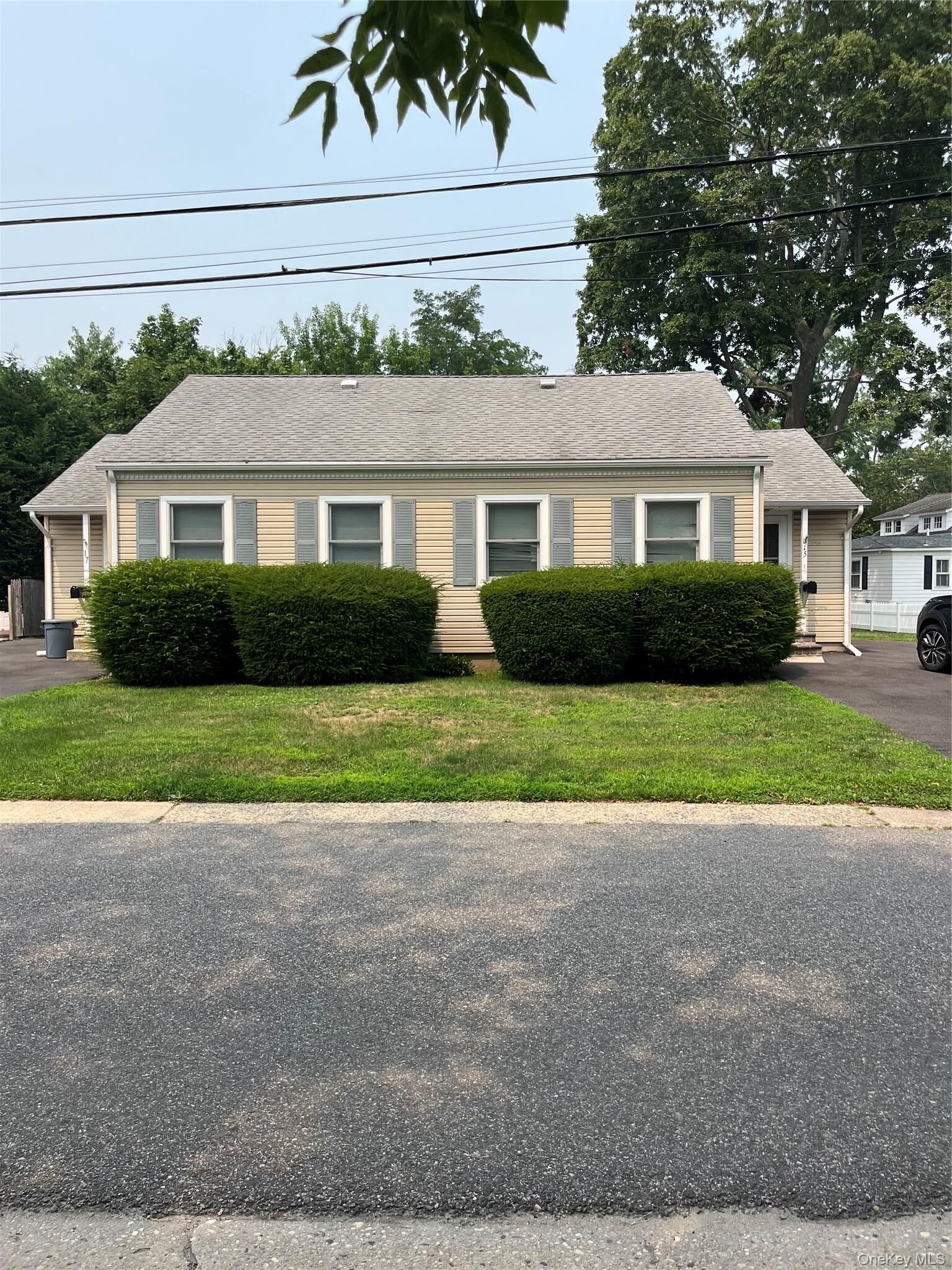 Property Photo:  15 Cedar Street  NY 11701 