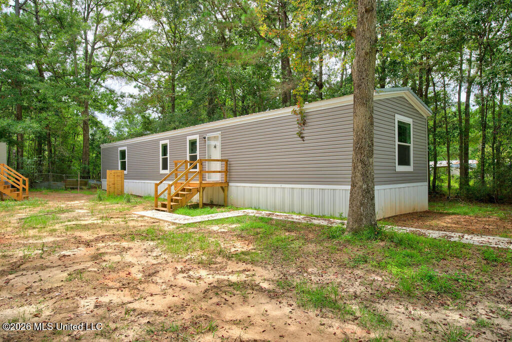 Property Photo:  7737 Narcissus Drive  MS 39553 