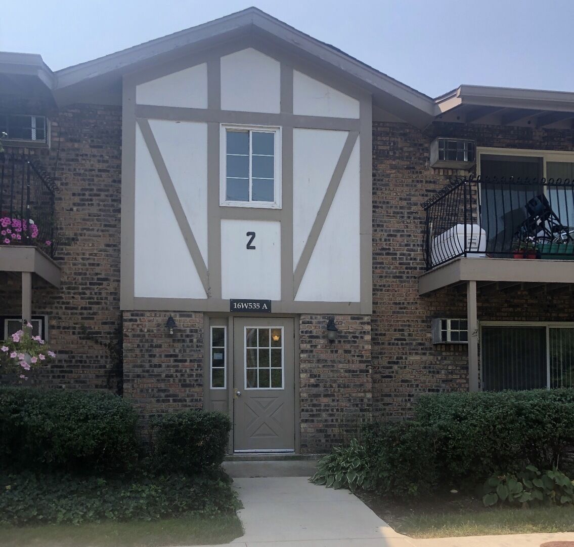 Property Photo:  16W535 79th Street 203  IL 60527 