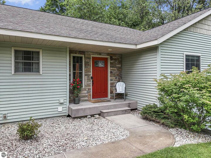 Property Photo:  210 Cinnamon Lane  MI 49696 