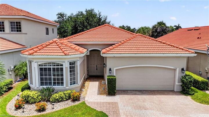 Property Photo: 15289 Laguna Hills Dr FL 33908