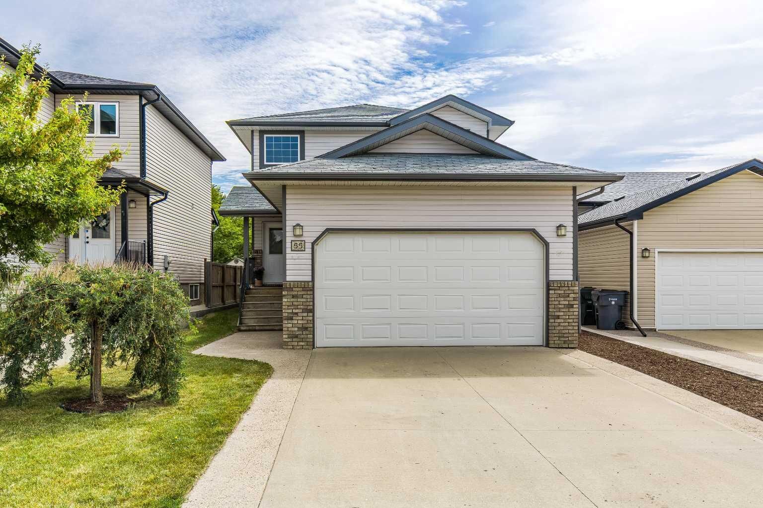 Property Photo: 55 Vista Close SE AB T1B 0A9