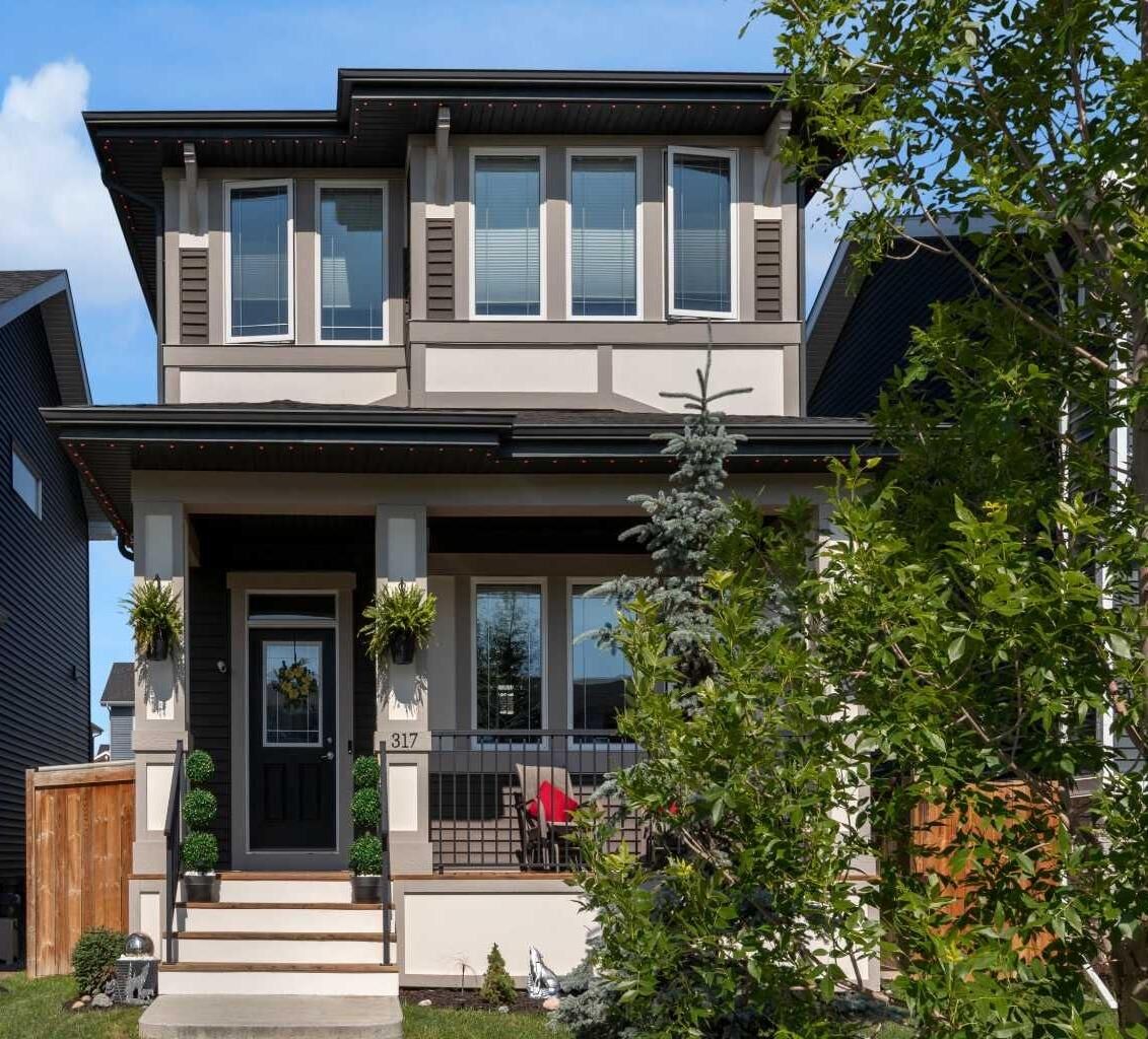 Property Photo: 317 Sundown Road S AB T4C 2T2