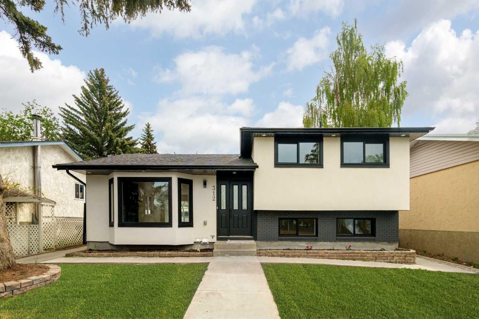 Property Photo: 312 Queensland Road SE AB T2J 3S6