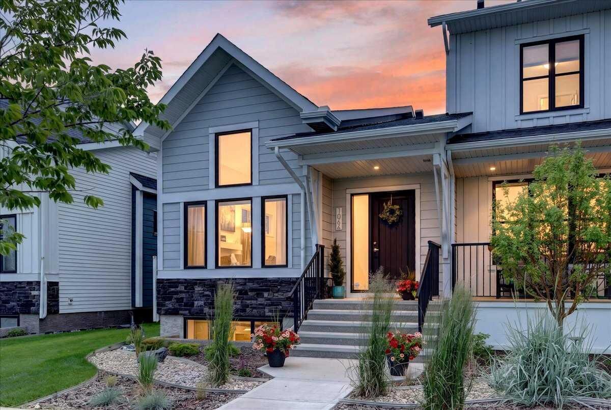 Property Photo: 1066 Creekside Boulevard SW AB T2X 5K6