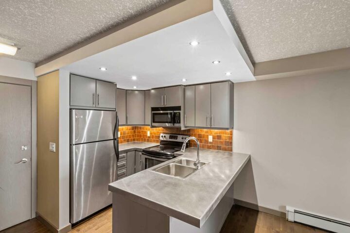 Property Photo: 2411 29 Street SW 104 AB T3E 2K3