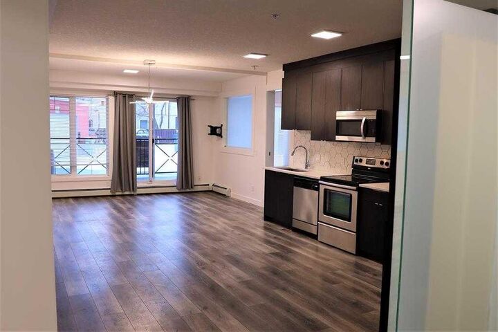 Property Photo: 117 19 Avenue NE 104 AB T2E 1N9