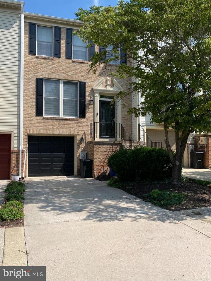 Property Photo:  42 Championship Court H-10  MD 21117 