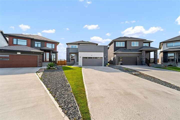Property Photo: 46 Dumontet Crescent MB R3X 0P4