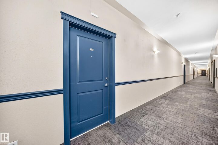 Property Photo: 245 Edwards Drive SW 317 AB T6X 1J9