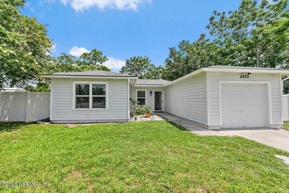 Property Photo:  8439 Collins Road  FL 32244 