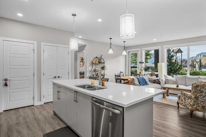 Property Photo: 106 Stewart Creek Rise 117 AB T1W 0N3